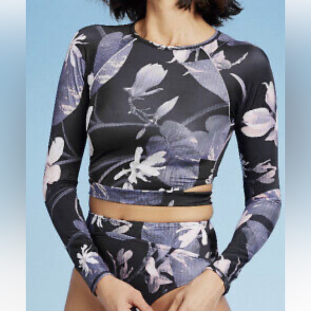 Long sleeve rash guard, gently used, minimum signs of wear, no holes or stains
